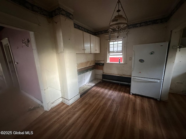 7 Frost Pl, Albany, NY 12205 - kitchen with freestanding refrigerator, dark wood-style floors, and white cabinetry
