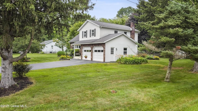 6458 Vosburgh Rd, Guilderland, NY 12009 - view of front facade with driveway, a chimney, an attached garage, and a front yard