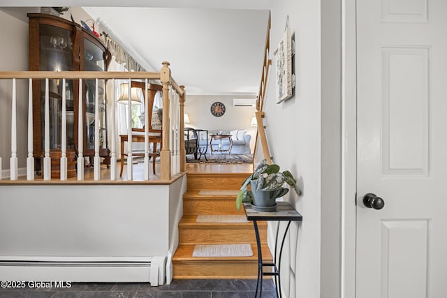 6458 Vosburgh Rd, Guilderland, NY 12009 - stairway with a baseboard heating unit and a wall unit AC