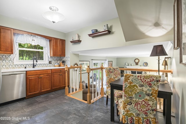 6458 Vosburgh Rd, Guilderland, NY 12009 - kitchen featuring stainless steel dishwasher, light countertops, backsplash, and brown cabinets