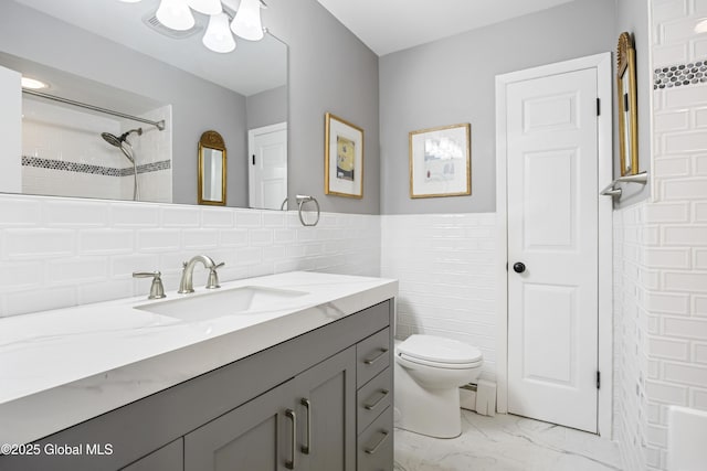 6458 Vosburgh Rd, Guilderland, NY 12009 - full bath featuring tile walls, vanity, marble look tiles, a shower, and a wainscoted wall
