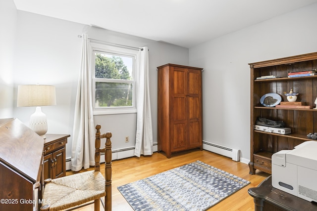 6458 Vosburgh Rd, Guilderland, NY 12009 - office with a baseboard heating unit and light wood finished floors