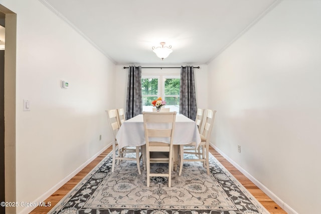 5012 Juniper Ln, Guilderland, NY 12303 - dining space with ornamental molding and wood finished floors
