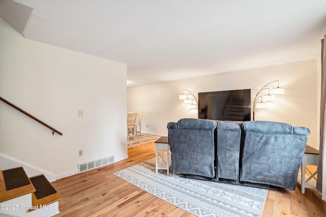 5012 Juniper Ln, Guilderland, NY 12303 - living room with wood finished floors and stairway