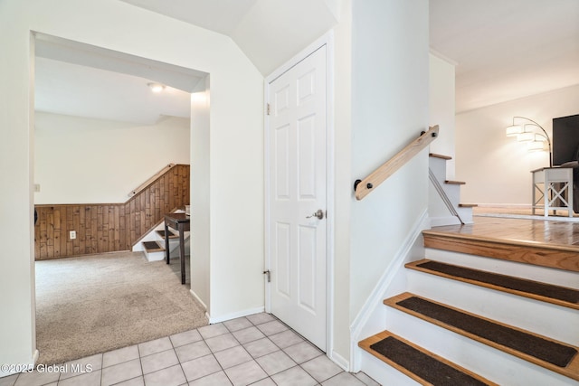 5012 Juniper Ln, Guilderland, NY 12303 - stairway featuring carpet flooring, tile patterned floors, and vaulted ceiling