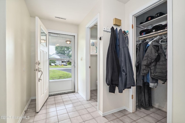 5012 Juniper Ln, Guilderland, NY 12303 - foyer featuring light tile patterned flooring