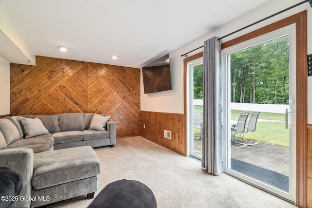 5012 Juniper Ln, Guilderland, NY 12303 - living room featuring wood walls, carpet flooring, recessed lighting, and wainscoting