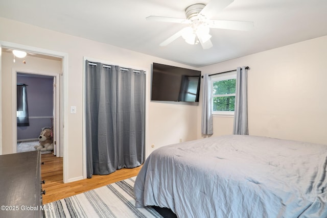 5012 Juniper Ln, Guilderland, NY 12303 - bedroom featuring light wood-type flooring and a ceiling fan