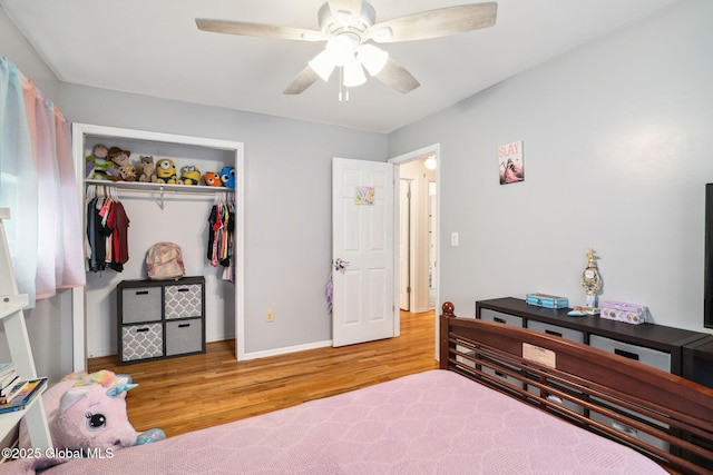 5012 Juniper Ln, Guilderland, NY 12303 - bedroom featuring a closet, wood finished floors, and ceiling fan