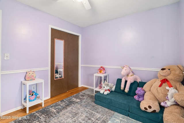5012 Juniper Ln, Guilderland, NY 12303 - sitting room featuring wood finished floors and a ceiling fan