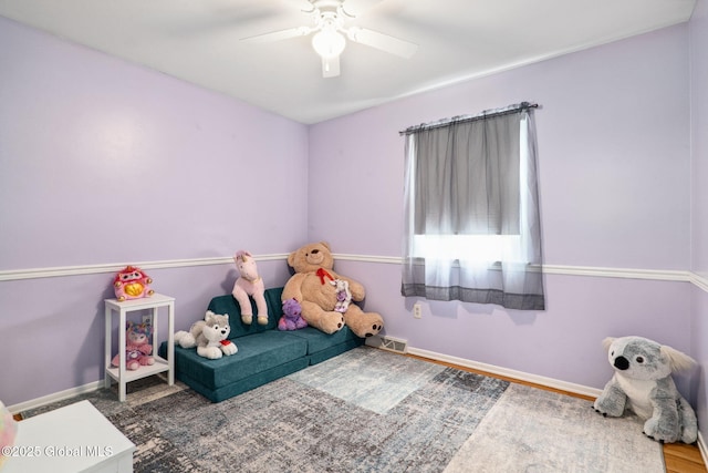 5012 Juniper Ln, Guilderland, NY 12303 - rec room with a ceiling fan and wood finished floors