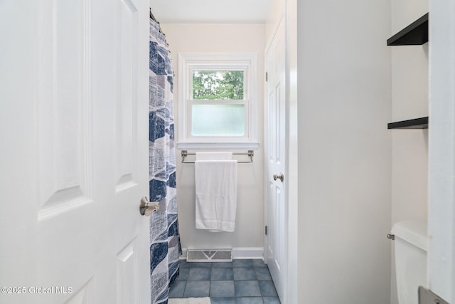 5012 Juniper Ln, Guilderland, NY 12303 - spacious closet with dark tile patterned floors