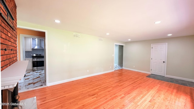 631 St Davids Ln, Niskayuna, NY 12309 - spare room with recessed lighting and light wood-type flooring