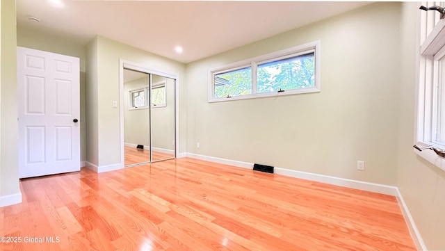 631 St Davids Ln, Niskayuna, NY 12309 - unfurnished bedroom with light wood-type flooring, a closet, and recessed lighting