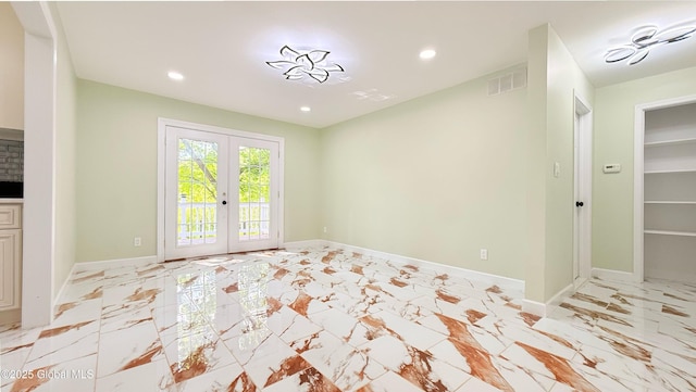 631 St Davids Ln, Niskayuna, NY 12309 - unfurnished dining area featuring french doors, recessed lighting, and light marble finish floors