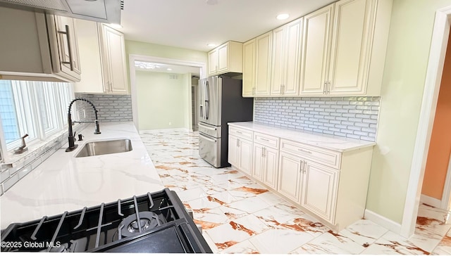 631 St Davids Ln, Niskayuna, NY 12309 - kitchen featuring stainless steel fridge with ice dispenser, recessed lighting, decorative backsplash, light stone countertops, and light marble finish flooring