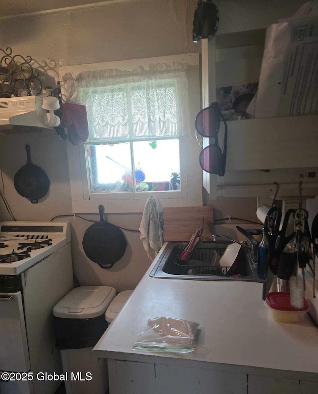 97 Library Ave, Warrensburg, NY 12885 - kitchen featuring exhaust hood and white gas range oven