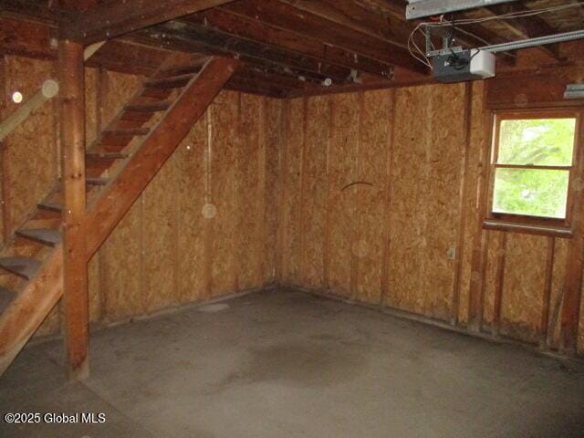 12 Chestnut St, Gloversville, NY 12078 - garage featuring a garage door opener
