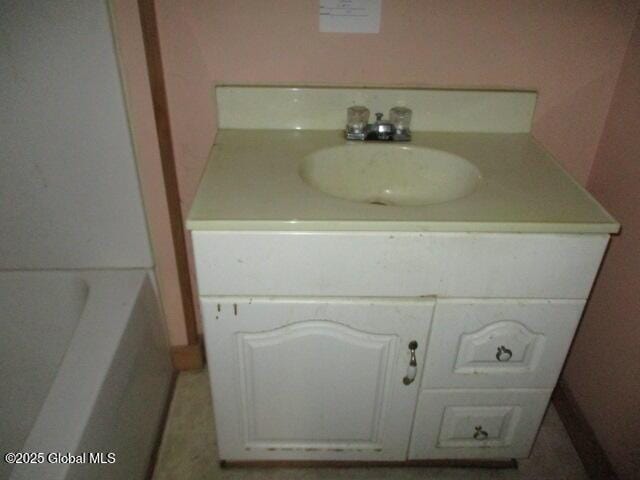 12 Chestnut St, Gloversville, NY 12078 - full bath featuring vanity and a tub to relax in