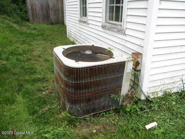 12 Chestnut St, Gloversville, NY 12078 - exterior view of a central AC unit
