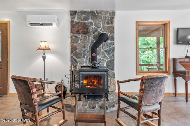 1062 S S Shore Rd, Hadley, NY 12835 - living area featuring an AC wall unit and a wood stove