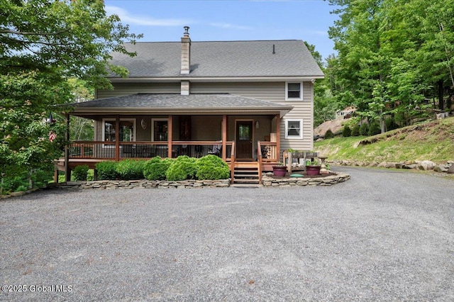 1062 S S Shore Rd, Hadley, NY 12835 - back of property with a shingled roof and a porch