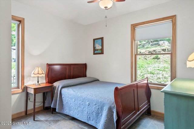 1062 S S Shore Rd, Hadley, NY 12835 - bedroom with baseboards and ceiling fan