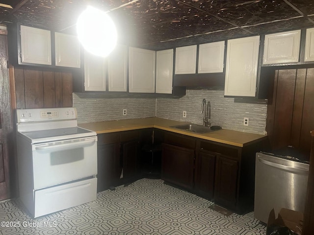 19 Williams St, Whitehall, NY 12887 - kitchen featuring white range with electric stovetop, tasteful backsplash, white cabinetry, and light countertops