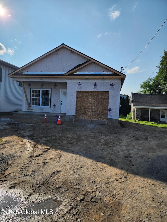 962 Florence Ave, Schenectady, NY 12303 - property in mid-construction with an attached garage and dirt driveway