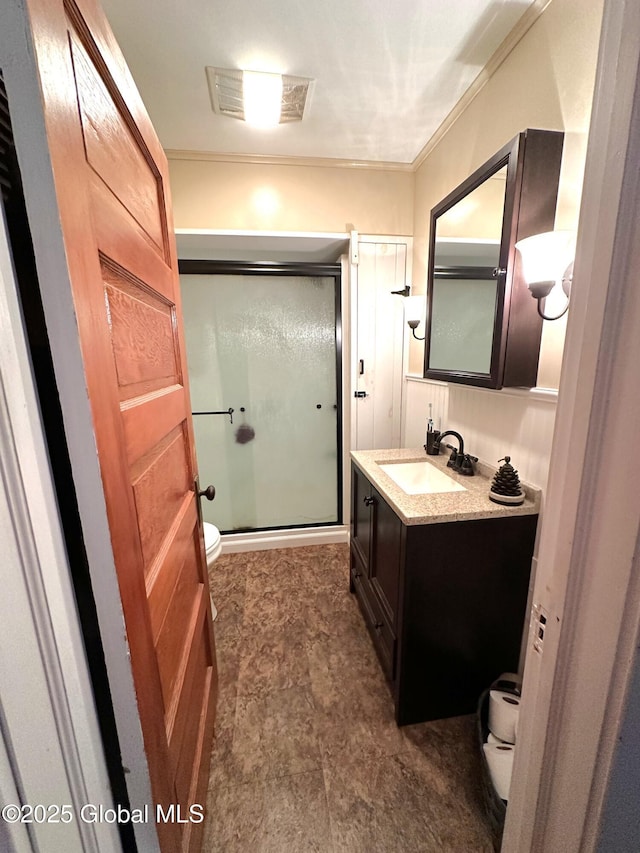 35 Walnut St, Canajoharie, NY 13317 - full bathroom featuring vanity, a shower stall, and crown molding