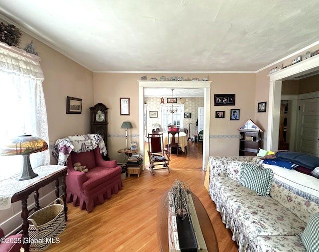 35 Walnut St, Canajoharie, NY 13317 - living area with light wood-type flooring and crown molding