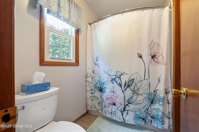 23 Tokay Ln, Colonie, NY 12309 - bathroom featuring tile patterned floors, a shower with shower curtain, and a textured ceiling