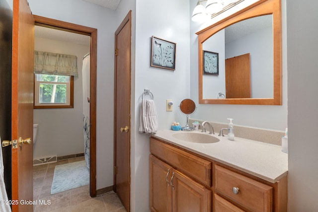 23 Tokay Ln, Colonie, NY 12309 - full bathroom with vanity and tile patterned flooring