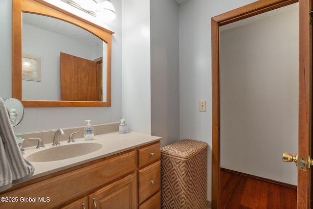 23 Tokay Ln, Colonie, NY 12309 - bathroom with vanity and wood finished floors