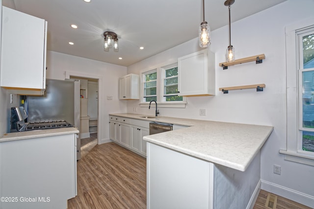 280 Vley Rd, Glenville, NY 12302 - kitchen with a peninsula, open shelves, white cabinetry, light wood-style flooring, and recessed lighting
