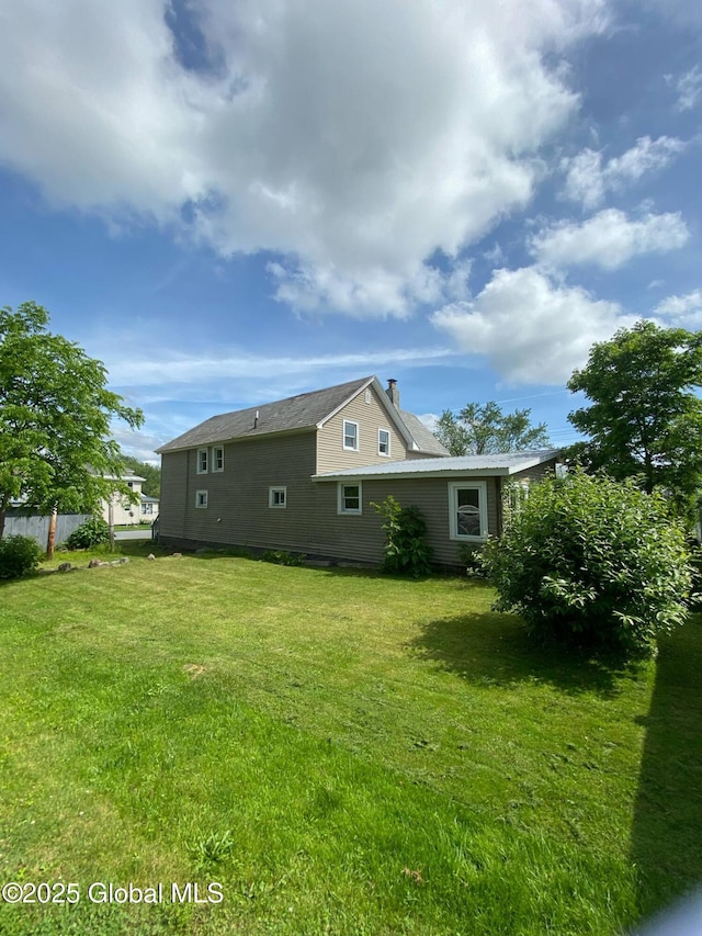 11 4th Ave, Whitehall, NY 12887 - back of property featuring a chimney and a lawn