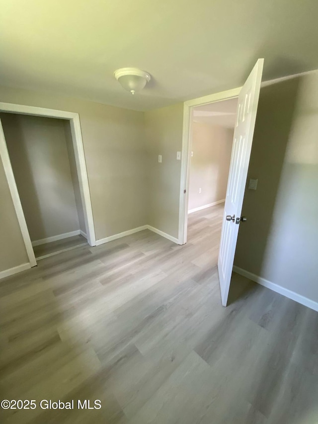 11 4th Ave, Whitehall, NY 12887 - empty room with baseboards and wood finished floors