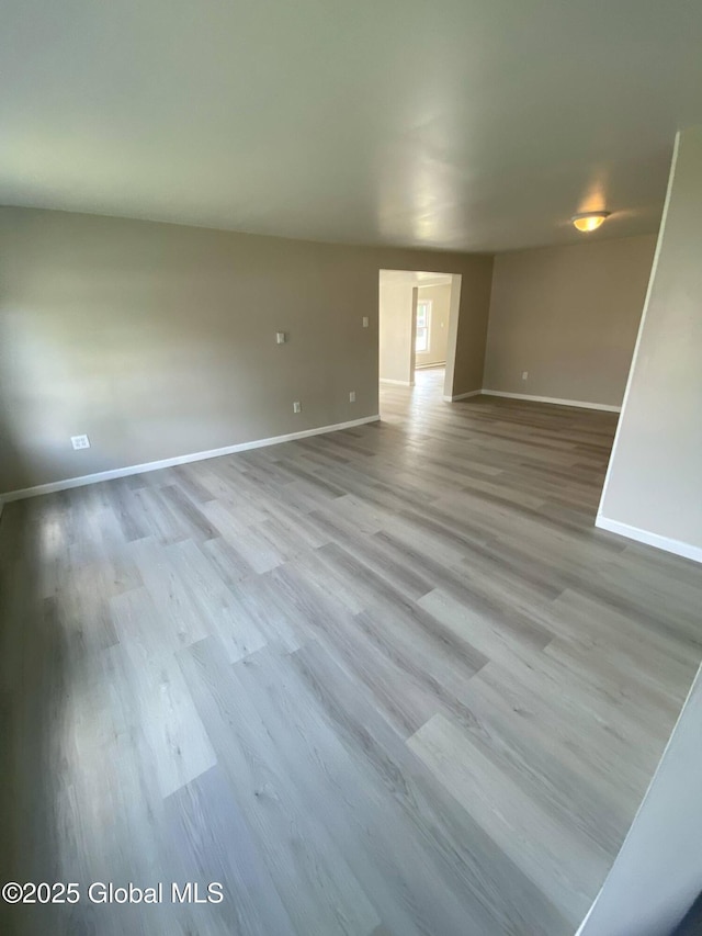 11 4th Ave, Whitehall, NY 12887 - spare room with baseboards and wood finished floors