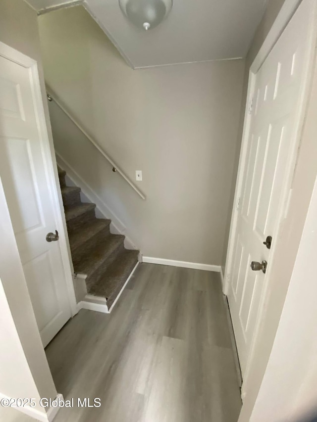 11 4th Ave, Whitehall, NY 12887 - staircase featuring wood finished floors and baseboards