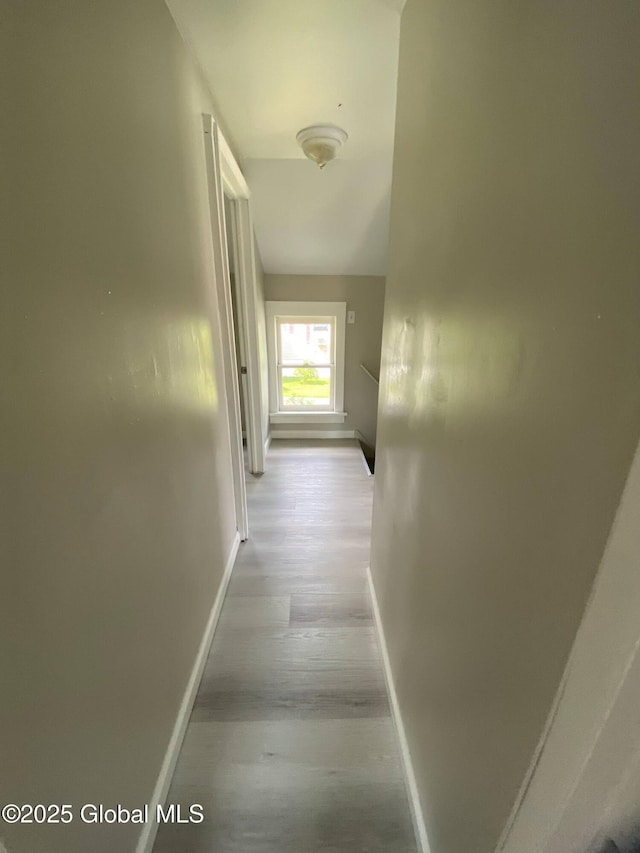 11 4th Ave, Whitehall, NY 12887 - hallway with baseboards and wood finished floors