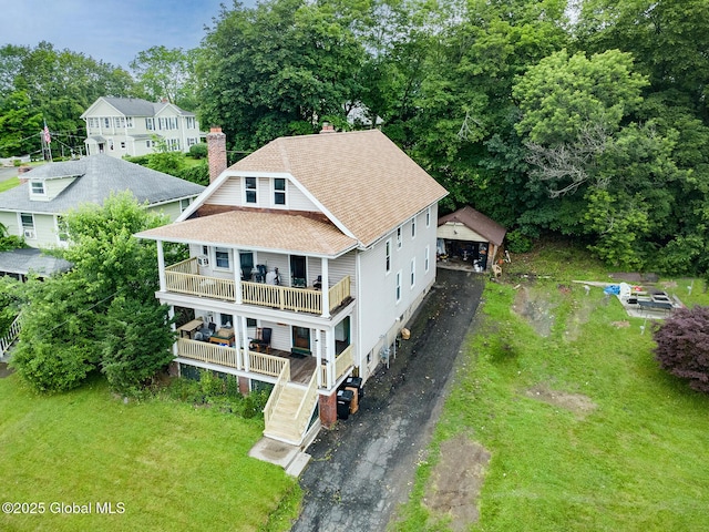 2303 Burdett Ave, Troy, NY 12180 - aerial view of property and surrounding area featuring a tree filled landscape