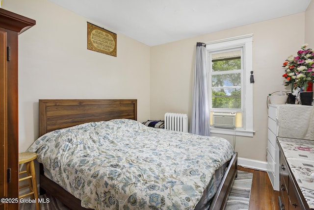 2303 Burdett Ave, Troy, NY 12180 - bedroom featuring radiator heating unit, dark wood-style floors, and cooling unit