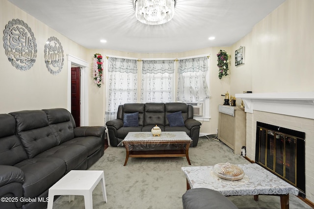 2303 Burdett Ave, Troy, NY 12180 - carpeted living room featuring a chandelier, cooling unit, a brick fireplace, and recessed lighting