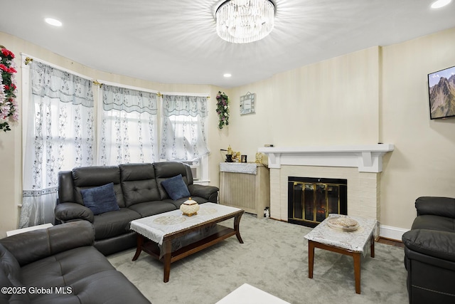 2303 Burdett Ave, Troy, NY 12180 - living room with a chandelier, a brick fireplace, and recessed lighting
