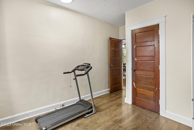 2303 Burdett Ave, Troy, NY 12180 - workout room featuring wood finished floors and baseboards