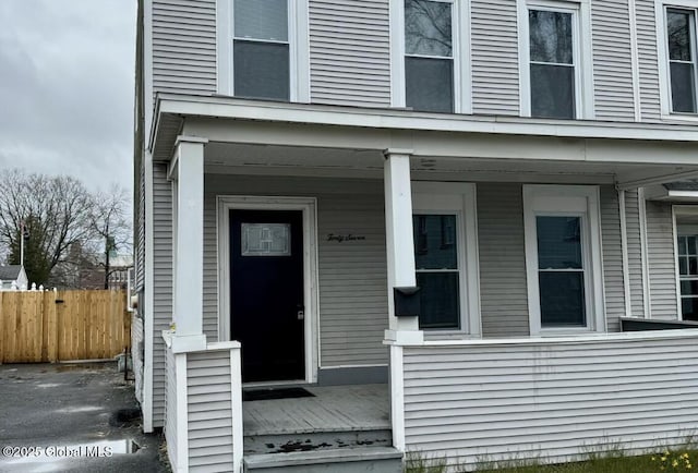 47 Chestnut St, Rensselaer, NY 12144 - doorway to property featuring covered porch