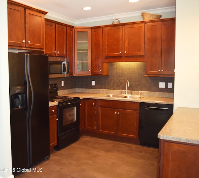9 Lancaster Pl, Milton, NY 12020 - kitchen with black appliances, ornamental molding, glass insert cabinets, backsplash, and light wood-type flooring