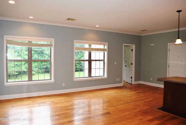 9 Lancaster Pl, Milton, NY 12020 - unfurnished living room featuring light wood-style floors, crown molding, and recessed lighting