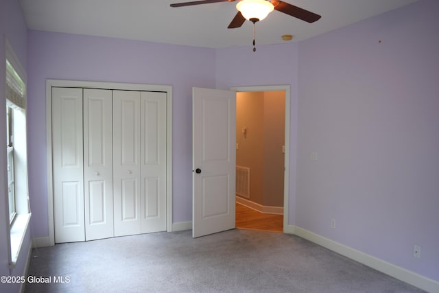9 Lancaster Pl, Milton, NY 12020 - unfurnished bedroom with carpet, a closet, and ceiling fan