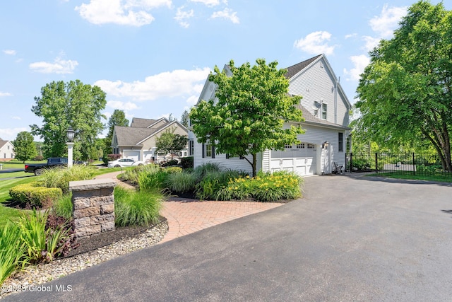 11 Fairview Ln, Halfmoon, NY 12118 - view of front of property featuring an attached garage and driveway